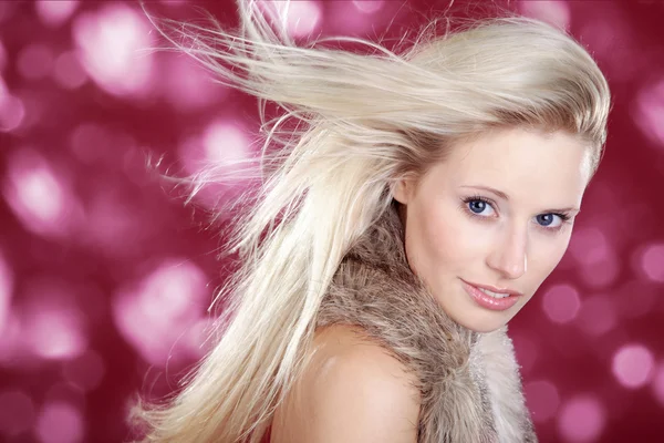 Glamorous blonde in animal fur — Stock Photo, Image