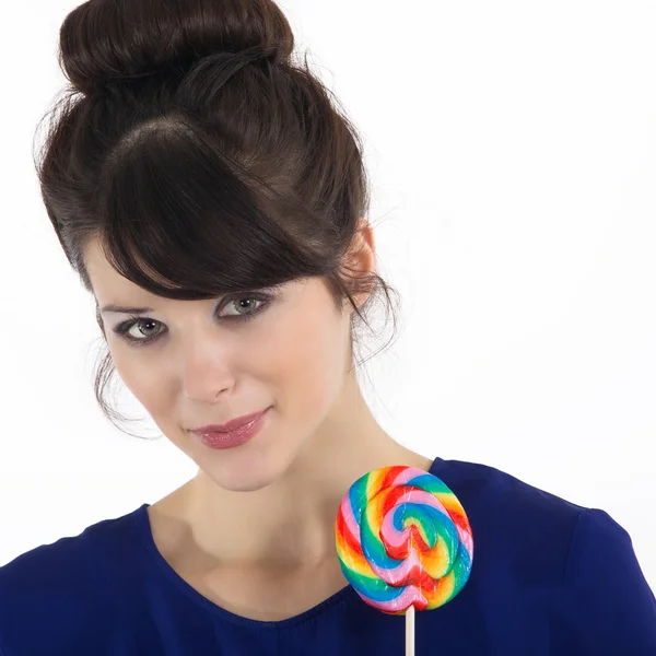 Brunette meisje met een zoete suikergoed — Stockfoto