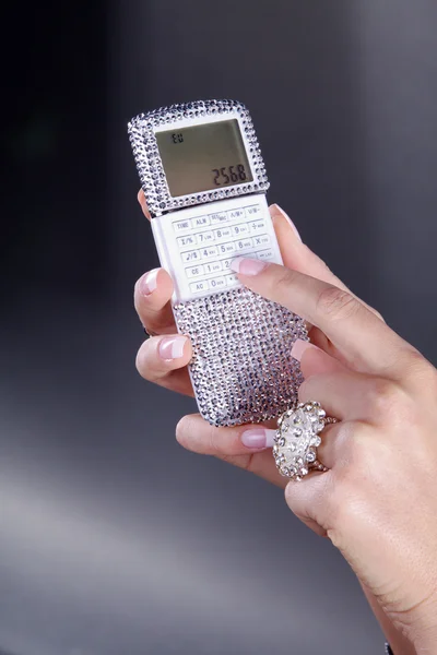 Calculadora glamourosa na mão meninas — Fotografia de Stock