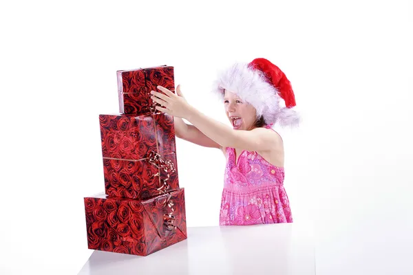 Giovane ragazza con regali di Natale — Foto Stock