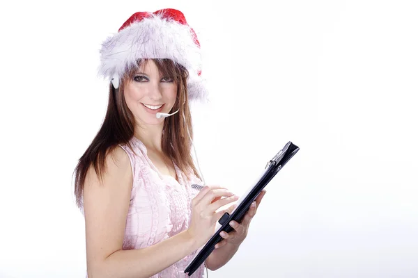 Christmas girl with a microphone and a notebook — Stock Photo, Image
