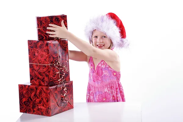 Young girl with Christmas gifts — Stock Photo, Image