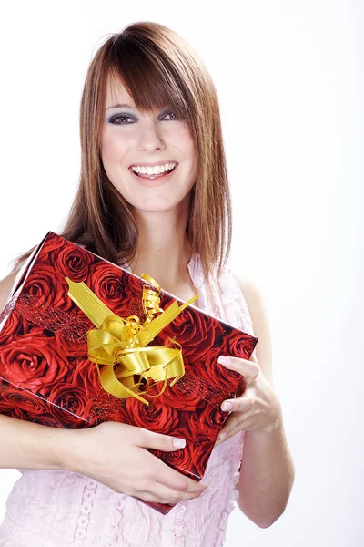 Weihnachten blonde Mädchen mit einem Geschenk — Stockfoto