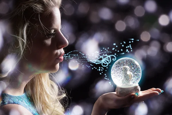 Blonde girl with a magic ball — Stock Photo, Image