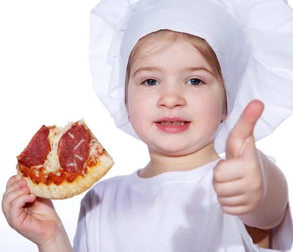 Kleines Mädchen isst Pizza und zeigt Zeichen — Stockfoto