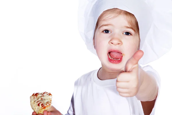 Little girl eating pizza and showing sign — Stock Photo, Image