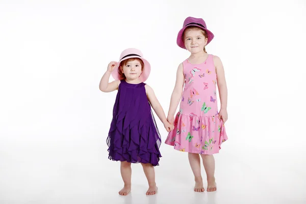 Two girls on a white background — Stock Photo, Image