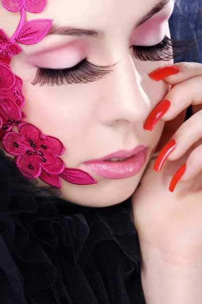 Chica rubia con la cara pintada —  Fotos de Stock