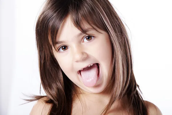 Niña muestra lengua — Foto de Stock