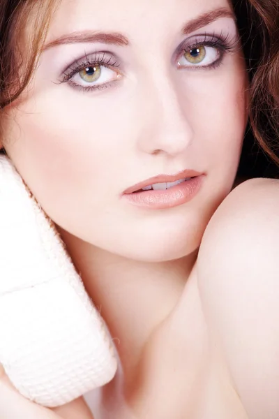 Brunette girl face with a washcloth — Stock Photo, Image