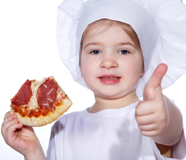 Little girl eating pizza and showing sign Stock Picture