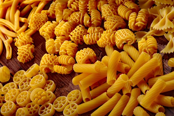 Pasta on a wooden table — Stock Photo, Image