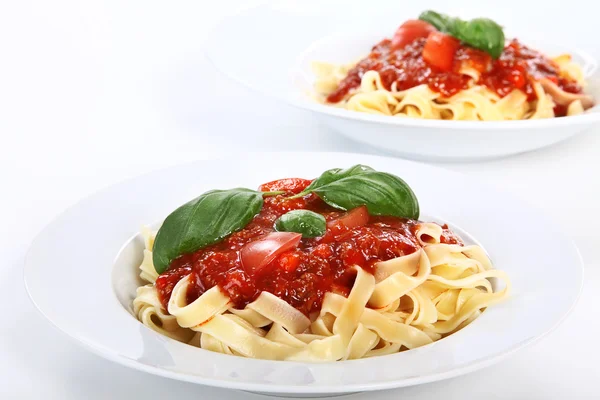 Two plates of spaghetti — Stock Photo, Image