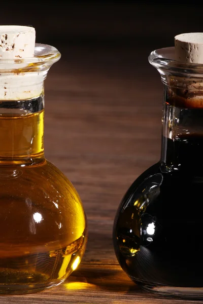 Oil in a glass bottle — Stock Photo, Image