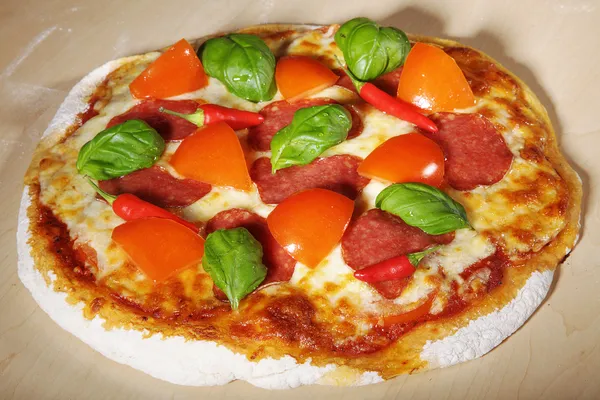 Tomato and sausage pizza — Stock Photo, Image