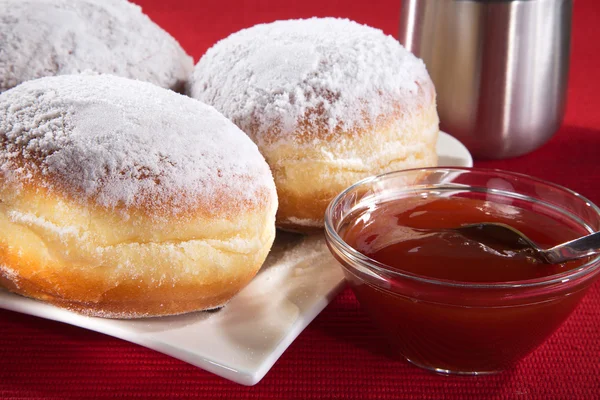 Donuts on a plate with jam — Stock Photo, Image