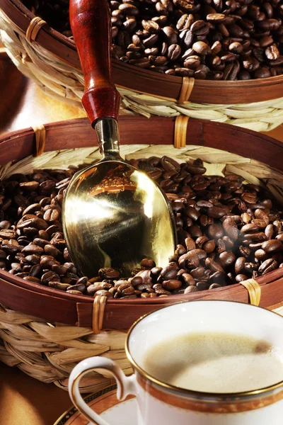 Coffee with sack of coffee beans — Stock Photo, Image