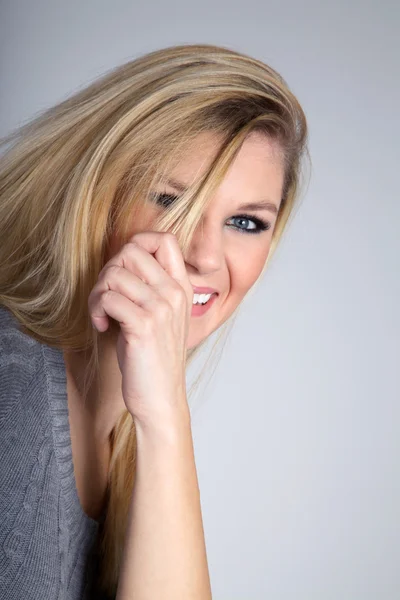 Blonde girl on a white background — Stock Photo, Image