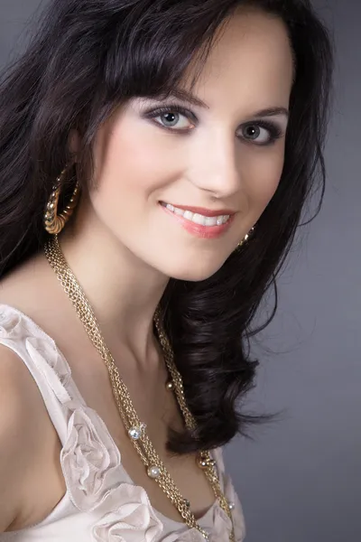 Brunette girl on a white background — Stock Photo, Image