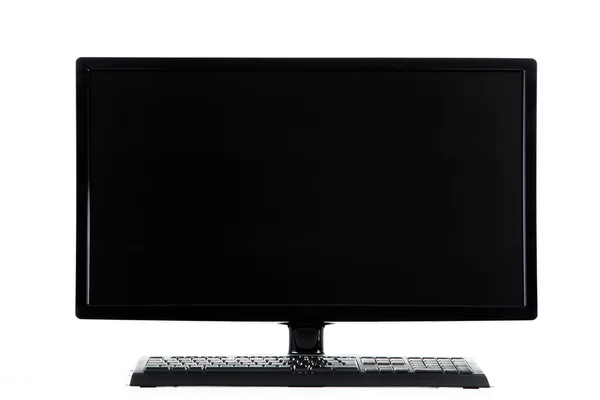 Computermonitor und Tastatur — Stockfoto