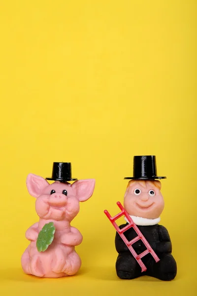 Toy man and pig — Stock Photo, Image