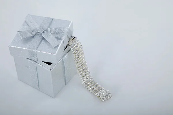 Christmas box with jewel — Stock Photo, Image