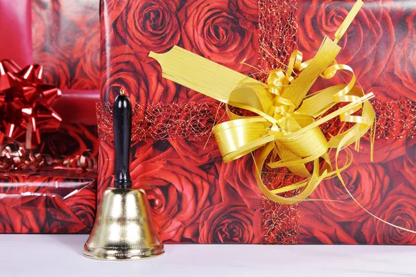 Christmas gift with a bell — Stock Photo, Image