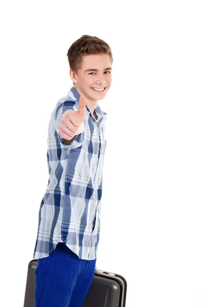 Boy with a case showing sign — Stock Photo, Image