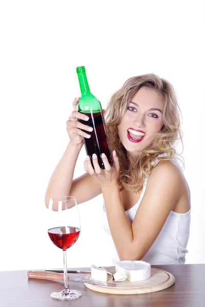 Blonde girl having lunch with wine — Stock Photo, Image