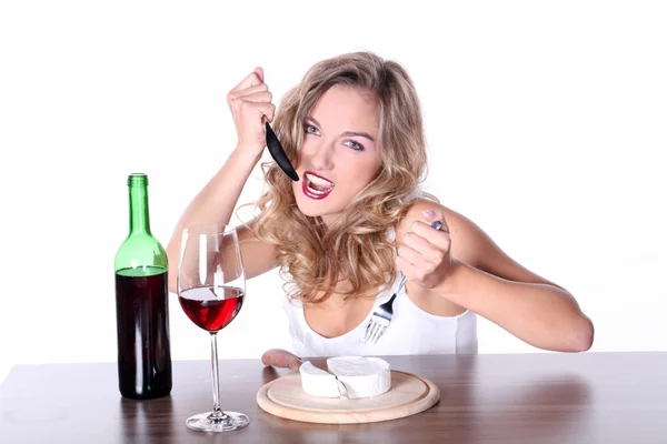 Blonde girl having lunch with wine — Stock Photo, Image