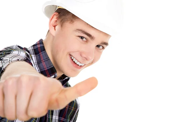 Young worker shows a sign — Stock Photo, Image