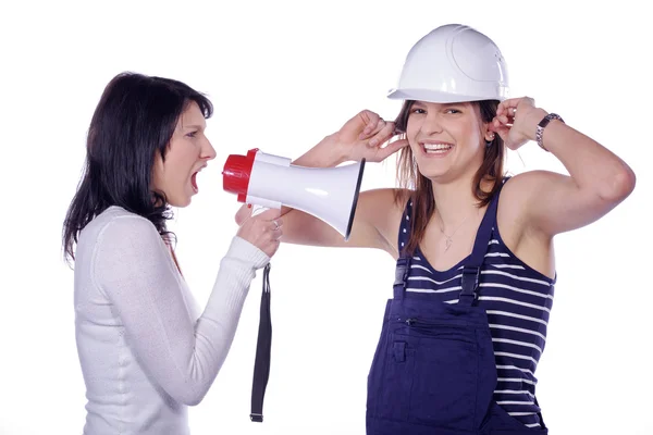 Girl shouts in a megaphone to architect — Stock Photo, Image