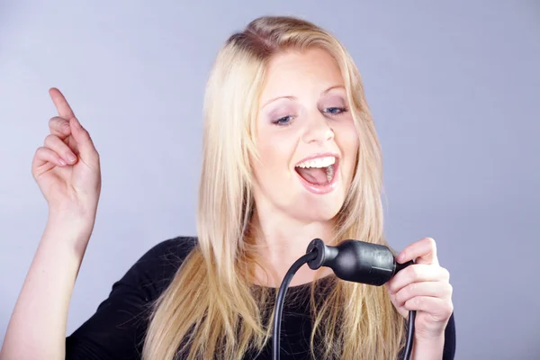 Blonde girl with a socket — Stock Photo, Image