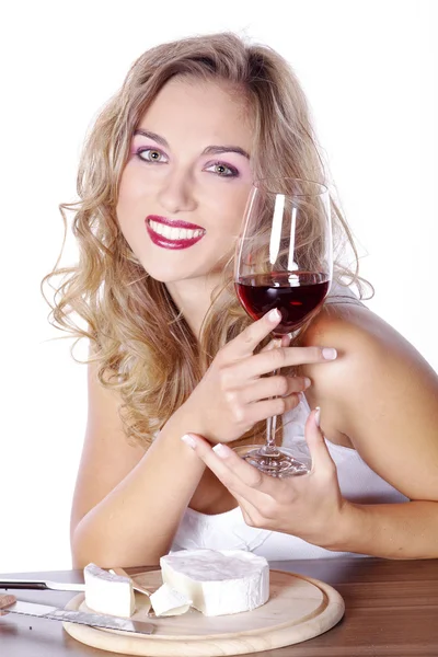 Blonde girl having lunch with wine — Stock Photo, Image