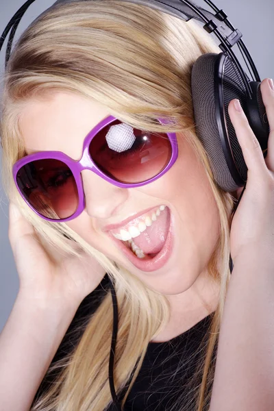 Blond girl with headphones — Stock Photo, Image