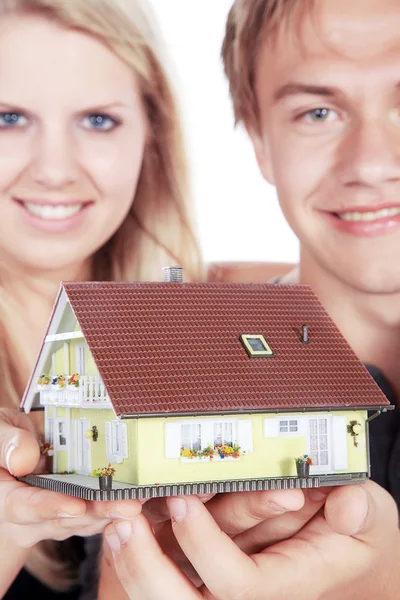 People with home model — Stock Photo, Image