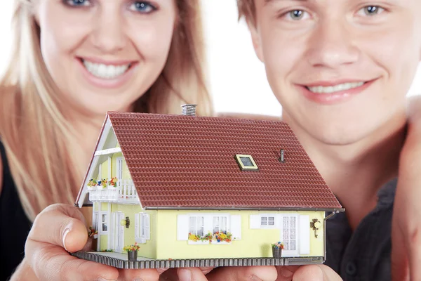 People with home model — Stock Photo, Image