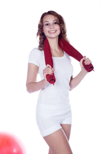 Young woman working out and stretching isolated — Stock Photo, Image