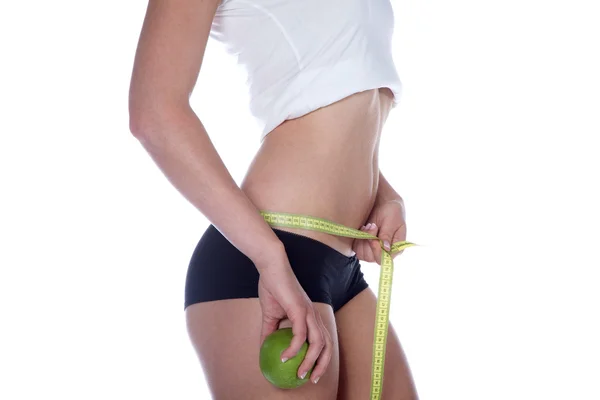 Mujer midiendo su cuerpo — Foto de Stock