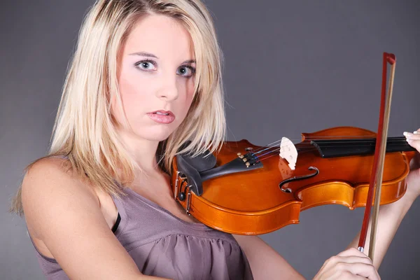 Beautiful young woman playing violin — Stock Photo, Image