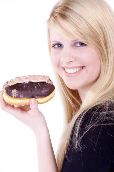 Menina loira come pão com chocolate — Fotografia de Stock