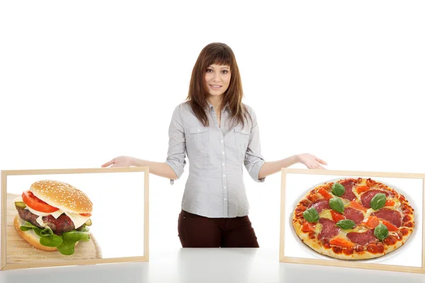 Girl with pictures of pizza and hamburger — Stock Photo, Image