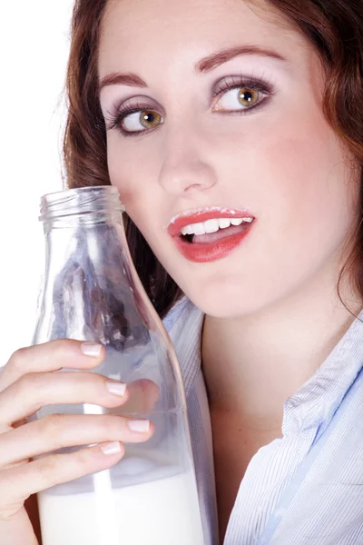 Attractive brunette with milk — Stock Photo, Image