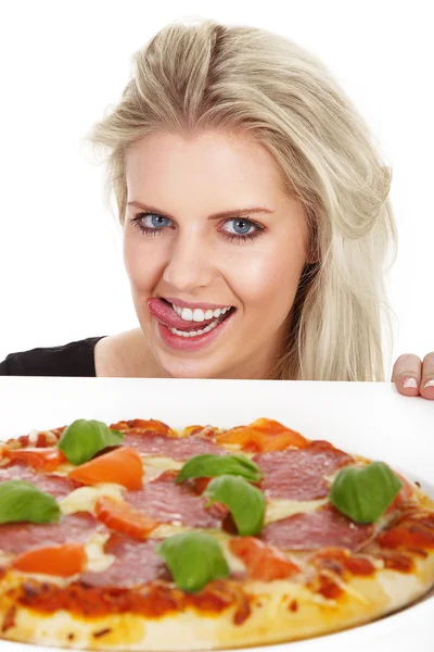 Jonge blonde vrouw met pizza — Stockfoto