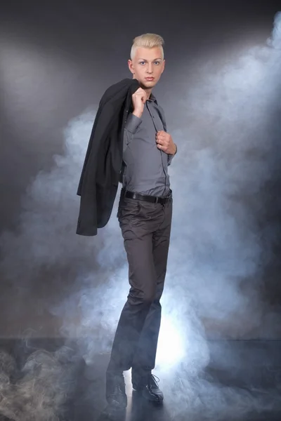 Fashion young man posing at studio — Stock Photo, Image