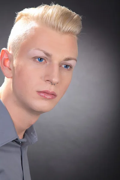 Fashion young man posing at studio — Stock Photo, Image