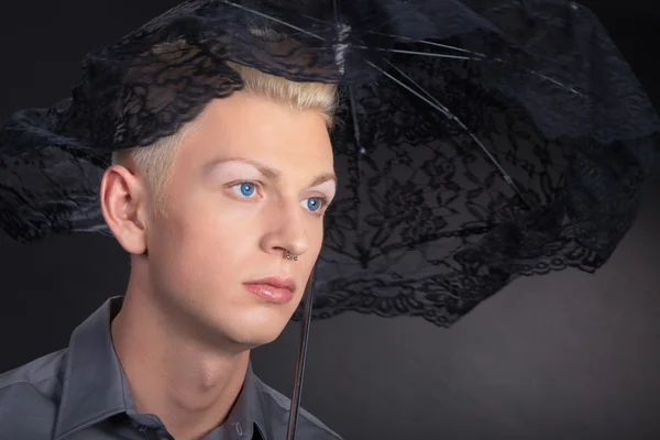 Blond boy under an umbrella — Stock Photo, Image