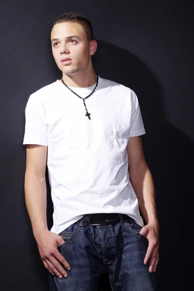 Fashion young man posing at studio — Stock Photo, Image
