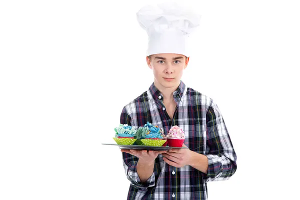 Junge mit Cupcakes — Stockfoto