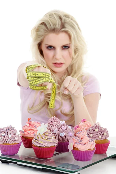 Young smiling woman with cupcake — Stock Photo, Image